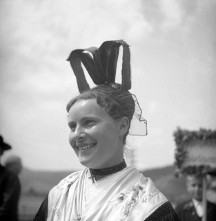 Woman in traditional traditional costume with hat