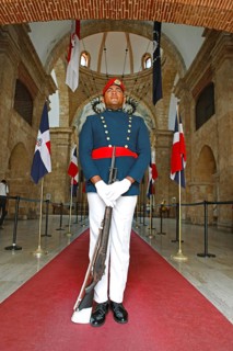 Man in uniform with rifle or guard at the entrance to the National Pantheon