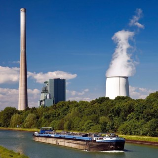 Cargo ship on the Datteln-Hamm Canal in front of the Bergkamen power station