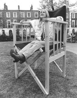 Woman in a large chair