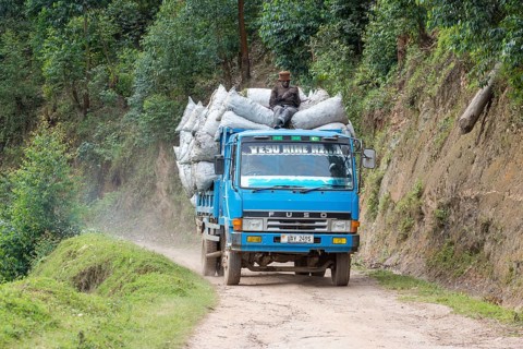 Fully loaded truck on sand road