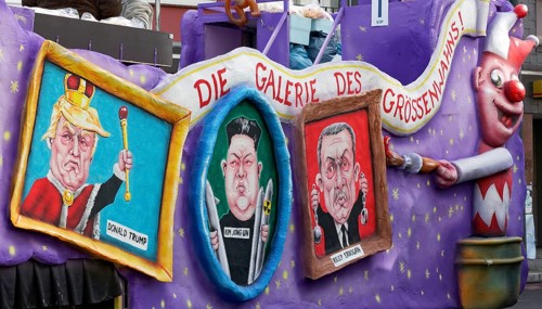 Portraits of autocratic presidents in picture frames