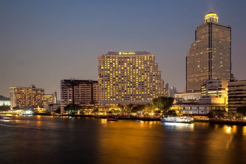 Lebua State Tower with hotel on the Chao Praya River
