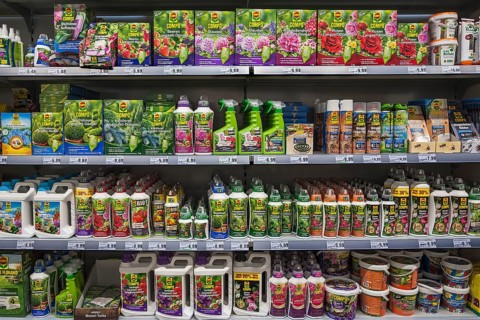 Shelf with pesticides and fertilizer
