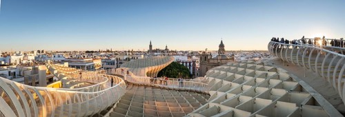 View from Metropol Parasol to numerous churches at sunset