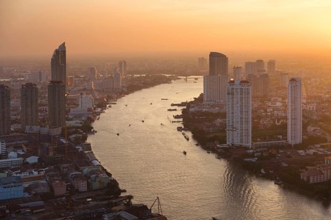 View from Lebua State Tower with river Mae Nam Chao Phraya at dusk