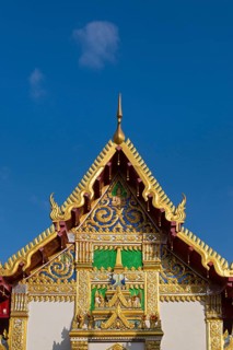 Pediment of the Bot in front of the Chedi of Wat Phra That Phanom
