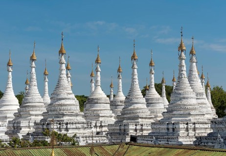 Row of white stupas at Sandamuni Pagoda