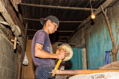 Kyrgyz man preparing the traditional Kyrgyz bread