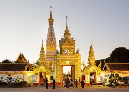 People in front Chedi of Wat Phra That Phanom
