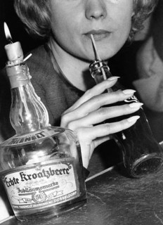 Woman drinking Coca Cola