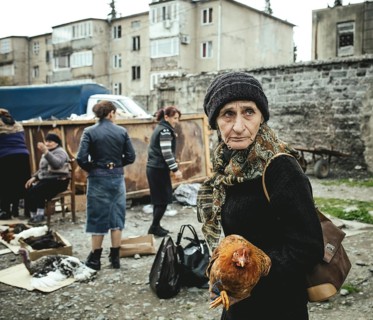 Woman with Chicken