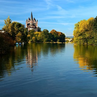 Limburg Cathedral St. Georg or Georgsdom and Limburg castle over the river Lahn in autumn