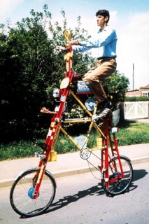 Man on a curious bicycle