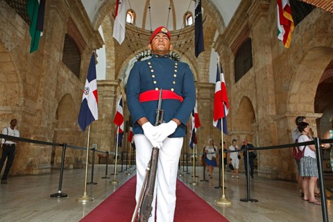 Man in uniform with rifle or guard at the entrance to the National Pantheon