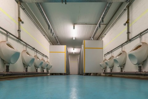 Men's toilet room in the decommissioned nuclear bunker