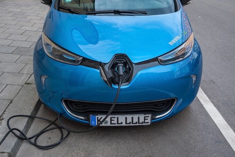 Electric car is charging charging cable