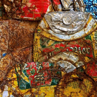 Stack of rusty and used metal beer cans