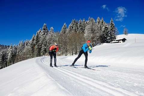 Olympic silver medalist Tobi Angerer with his wife Romy on the cross-country ski trail of Winklmoos-Alm