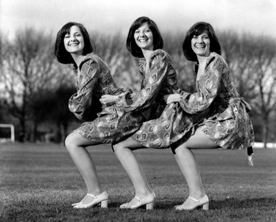 Three women in a squat
