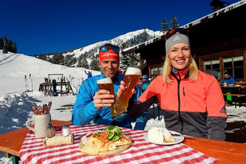 Olympic silver medal winner Tobi Angerer with his wife Romy at the snack on the Wildalm