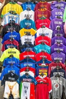 Football jerseys with names of football players for sale at sales stall