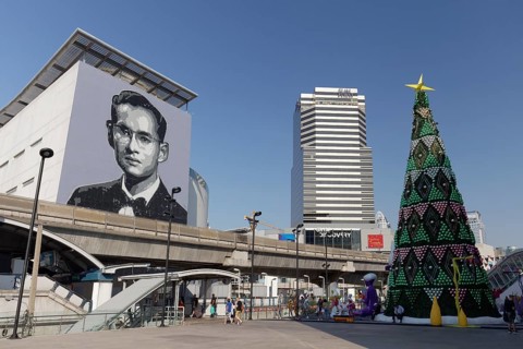 Portrait of the young Bhumibol Adulyade on the house wall