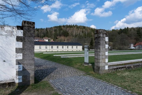 View through a camp gate to the former laundry