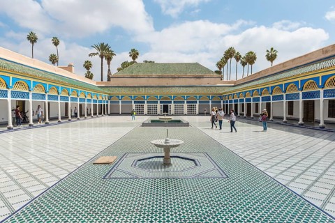 Ornate courtyard with columns and fountain