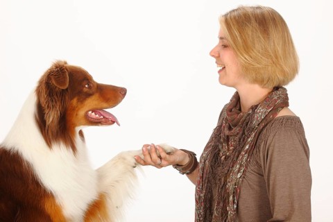Woman and Australian Shepherd
