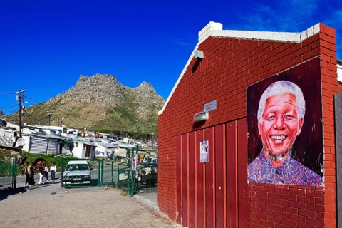 Nelson Mandela portrait on a wall of Imizamo Yethu township