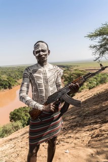 Warrior with rifle
