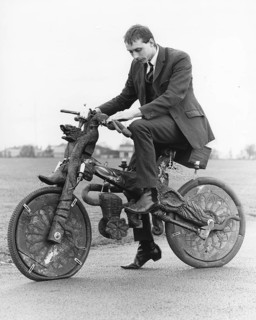 Man on a strange bicycle