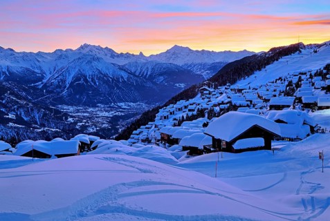 View of the snow-covered village overlooking the Rhone valley towards Dom 4545m