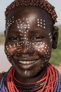 Young woman with face painting
