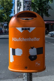 Municipal wastepaper basket with homorous slogan