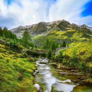 Stream flows through mountain landscape