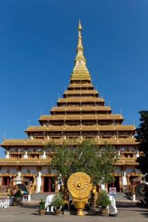Wheel of Life in front of a nine-story Stupa Phra Mahathat Kaen Kakhon