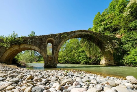 Old Ottoman stone arch bridge Ura e Golikut over river Shkumbin