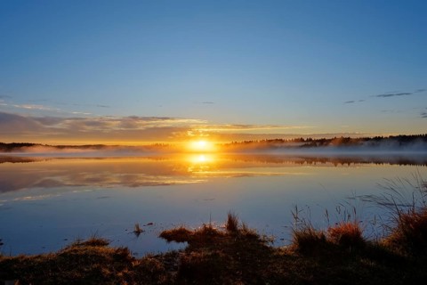 Sunrise with early morning mist over Kirchsee
