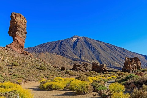 Rock formation Los Roques de Garcia in front of volcano Pico del Teide
