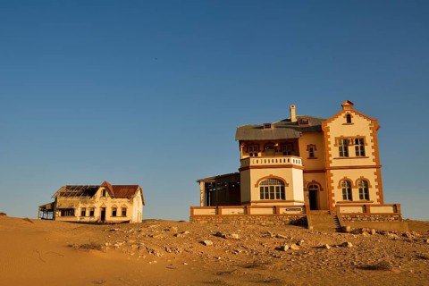 Decaying houses of the accountant and mine manager of the former diamond town Kolmanskop