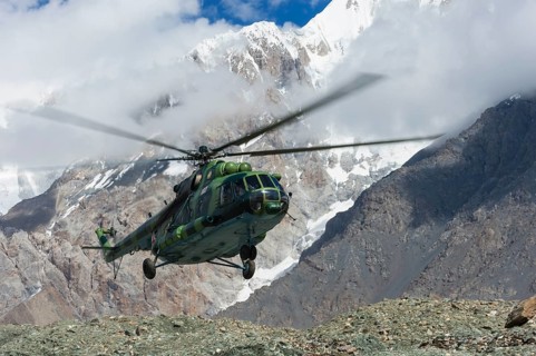 Helicopter landing at the Khan Tengri Base Camp