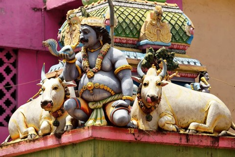 Colorful Hindu temple decorated with figures and gods