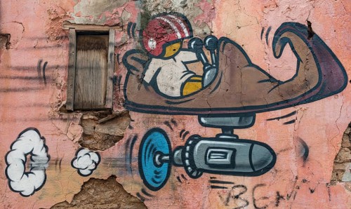Graffiti on a wall with cracks