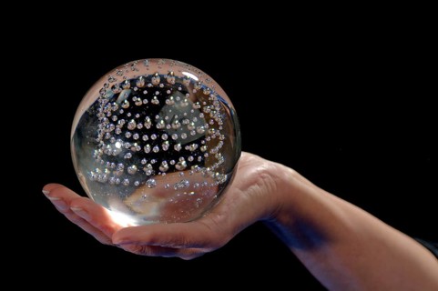 Glass ball in a woman's hand