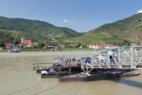 Ferry across the Danube to Spitz an der Donau with parish church St. Mauritius