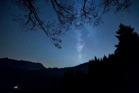 Milky Way over the mountains and forest at Schwagalp