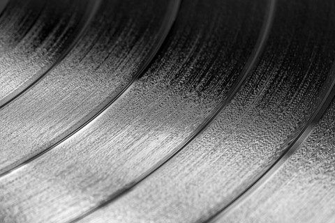Close-up of a black retro record surface