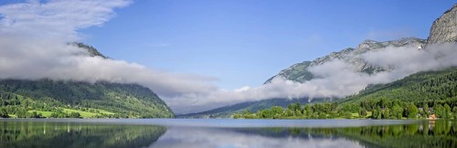 Panoramic view over the Grundlsee with low clouds